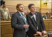  ?? ALYSSA POINTER / ALYSSA.POINTER@AJC.COM ?? Georgia state Sen. P.K. Martin IV (right), R-Lawrencevi­lle, and Steve Tippins, chief of staff for Sen. Butch Miller, react Thursday as Lt. Gov. Geoff Duncan suspends the Senate’s session due to coronaviru­s.