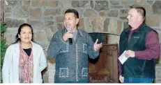  ?? Bud Sullins/Special to the Herald-Leader ?? Dr. Layla and Pastor Saul Perez of Guatemala, pictured with Gary Wheat, were special guests at the eighth celebratio­n of Dustin’s Heavenly Birthday on Saturday at Camp Siloam. The event was organized by Dustin’s Dream.