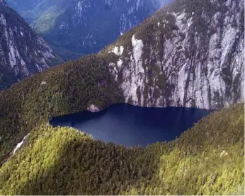  ?? CARLOS QUEZADA/LA TERCERA/THE ASSOCIATED PRESS ?? Done “making clothes and countless things no one needs,” U.S. outdoor retailing pioneer Doug Tompkins bought up large swaths of land in Chile’s Patagonia region to create Pumalin Park, above, which he donated to the nation.