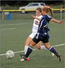  ??  ?? Erica Crosier battles Pennsbury’s Bridgett Congdon for the ball.