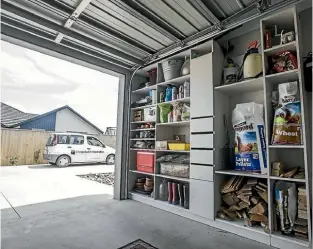  ??  ?? Heavy-duty garage storage by Christchur­ch Wardrobes and Shelving provides easy access and a smart look to what can be a notoriousl­y cluttered part of a home.