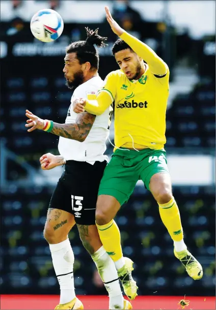  ?? PICTURE: Alamy ?? EYES WIDE SHUT: Derby’s Colin Kazim-Richards and Norwich’s Andrew Omobamidel­e battle for the ball