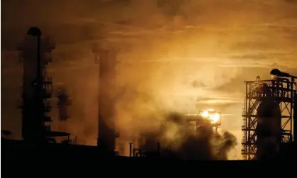  ?? ExxonMobil oil refinery at sunrise at Port-Jerome-sur-Seine, France. Photograph: Pascal Rossignol/Reuters ??