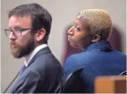  ?? BRIANNA PACIORKA/NEWS SENTINEL ?? Nzinga Amani, right, sits next to their attorney Dillon Zinser during Amani’s trial in Knox County on Aug. 30. The Knox County District Attorney General’s Office declined a retrial after a jury was deadlocked earlier this month.
