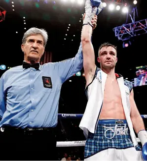  ?? Photos: ESTHER LIN/SHOWTIME ?? THE TARTAN TORNADO: Taylor thuds Alfonso Olvera with a left hand [above left] and has his hand raised in Las Vegas [above] after being taken the distance for the first time as a profession­al by the gritty Mexican. Josh gets a proper feel for a Vegas...