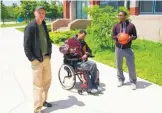  ?? PHOTO COURTESY MICHAEL JAMES ?? From left, Rus Bradburd, former NMSU Aggie Shawn Harrington and Tyrese Williford, outside Chicago’s Marshall High School.