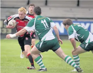  ?? WALES RUGBY LEAGUE ?? Scott, left, playing for the Wales Dragonhear­ts against Ireland in 2009