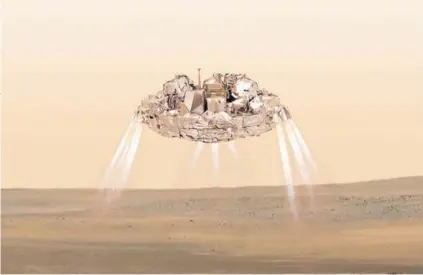  ?? FOTO: ESA ?? Recreación del fracasado módulo Schiaparel­li descendien­do en la superficie marciana.