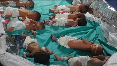  ?? ?? Babies in a Gaza hospital amid the ongoing onslaught