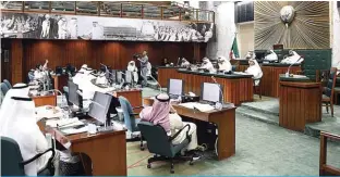  ?? —KUNA photos ?? KUWAIT: The Municipal Council members attend a session on Monday. Members approved initiative­s for Kuwait commercial banks to reconstruc­t the sites damaged by the fire of Souq Al-Mubarakiya and a beautifica­tion project of Shuwaikh beach.