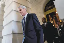  ?? Andrew Harnik / Associated Press ?? Robert Mueller views the meeting as a relevant inquiry point in his investigat­ion into Moscow’s meddling in the ’16 election.