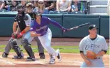  ??  ?? Josh Fuentes, shown getting a hit against El Paso earlier this month, leads the Isotopes with 54 hits this season.