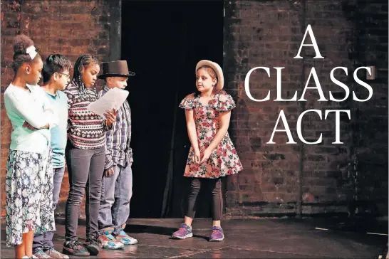  ?? [KYLE ROBERTSON/DISPATCH PHOTOS] ?? Veda Beebe, center, a fourth-grade student at West Broad Elementary, takes part in “The Fossil Adventure,” which her class created as part of a program with the theater organizati­on CATCO.