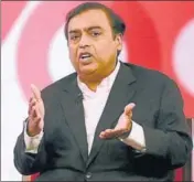  ??  ?? RIL CMD Mukesh Ambani: Adding fuel to competitio­n PTI/FILE