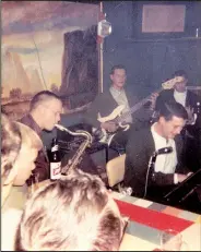  ?? Courtesy photo ?? Marley, seated at the piano, performs at the Huddle Club in Fayettevil­le in 1961.