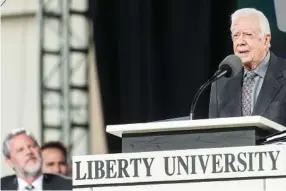  ?? LATHAN GOUMAS/THE NEWS & ADVANCE VIA THE ASSOCIATED PRESS ?? Former President Jimmy Carter spoke at the 45th Liberty University commenceme­nt at Williams Stadium last Saturday in Lynchburg, Virginia.