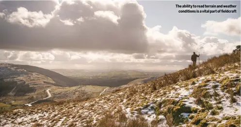  ?? ?? The ability to read terrain and weather
conditions is a vital part of fieldcraft