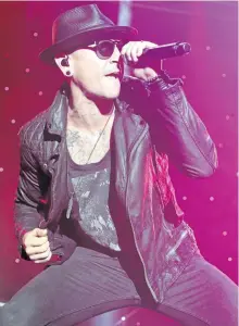  ?? OWEN SWEENEY/INVISION ?? Chester Bennington performs in concert during the 2015 Shindig Music Festival in Baltimore. The Los Angeles County coroner says Bennington, who sold millions of albums with a unique mix of rock, hip-hop and rap, has died in his home near Los Angeles....