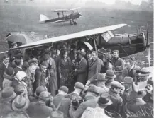  ?? ?? 0 US aviator Amelia Earhart greets fans at Hanworth airfield after crossing the Atlantic on this day in 1932