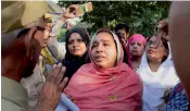  ?? — PTI ?? Missing JNU student Najeeb Ahmad’s mother Fatima argues with the police during a protest in New Delhi last Friday.