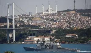  ??  ?? A US NAVY guided-missile cruiser sets sail in the Bosphorus, on its way to the Black Sea last week.