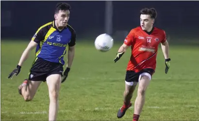  ??  ?? Joe McHugh of Easkey/Enniscrone/Kilglass in action with St Mary’s Scott Lynch in Scarden on Saturday. Pics: Donal Hackett.