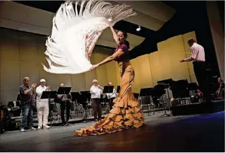  ?? PHOTO BY DAVIS SUSSAN ?? French horn player and flamenco dancer Eva Conti, pictured here with members of the Stamford Symphony, will dance in program two of the Palm Beach Chamber Music Festival.
