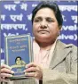  ?? PTI ?? Mayawati releases a book, in Lucknow on Sunday.