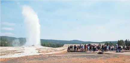  ?? KATHARINE LACKEY/USA TODAY ?? Old Faithful erupts Aug. 4 in Yellowston­e National Park. The geyser got its name because viewers can count on it to put on its show about every 90 minutes.