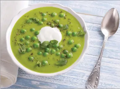  ?? TRIBUNE CONTENT AGENCY ?? The secret to making this creamy, springlike soup is using frozen peas.