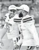  ?? DAVID RICHARD/AP ?? Browns quarterbac­k Baker Mayfield, left, and receiver Odell Beckham Jr. walked off as winners on Thursday night.