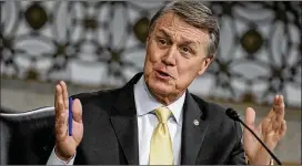  ?? GREG NASH / ASSOCIATED PRESS ?? GOP incumbent Sen. David Perdue is in no way shunning the president, but a 10-day scan of his Twitter account shows few direct references to him. Rather, Perdue has stressed issues related to the coronaviru­s.