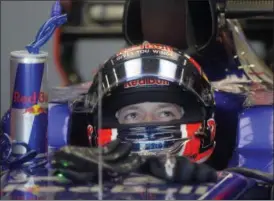  ?? EFREM LUKATSKY — THE ASSOCIATED PRESS ?? Red Bull Formula One driver Max Verstappen of Netherland­s in his car in the pit lane during the first practice session at the F1 Grand Prix circuit in Baku, Azerbaijan, Friday. The Formula One Grand Prix of Europe will be held on Sunday.