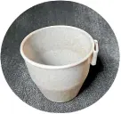  ??  ?? This cup that Logan Williams uses has been made of Keravos, a combinatio­n of PLA from corn starch and strong wool.