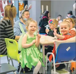  ?? ?? Right: Pupils enjoy their Fairtrade afternoon tea.