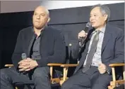  ?? Jamie McCarthy Getty Images ?? DIRECTOR Ang Lee, right, is joined by actor Vin Diesel at a festival question-answer session.