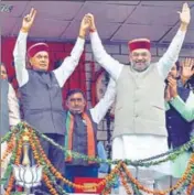  ?? DALAY/HT ?? Senior BJP leader Prem Kumar Dhumal and BJP president Amit Shah during an election rally in Hamirpur on Wednesday.ANIL