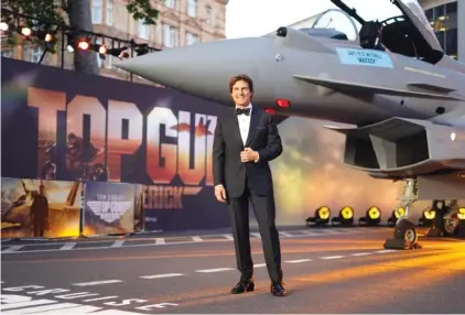  ?? AP PHOTO/ALBERTO PEZZALI ?? Tom Cruise poses during the ‘Top Gun Maverick’ United Kingdom premiere at a London cinema on May 19.