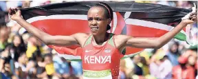  ?? AP ?? Kenya’s Jemima Sumgong celebrates winning the women’s marathon during the Summer Olympics athletics event in Rio de Janeiro, Brazil, in 2016.