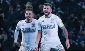  ??  ?? Stuart Dallas (right) celebrates scoring Leeds’ equaliser. Photograph: Malcolm Bryce/ ProSports/REX/Shuttersto­ck