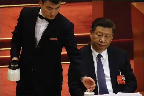  ?? Photo: AP ?? „ President Xi Jinping at yesterday’s meeting in Beijing of the National People’s Congress, who voted to allow him to rule indefinite­ly.
