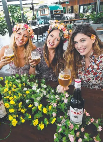  ??  ?? Jenny Gillot, Haylee McCulloch and Francesca Virga have a Pimm’s taste test