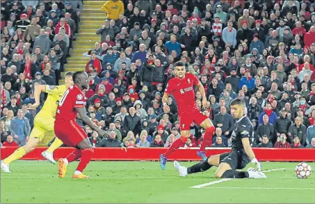  ?? ?? Liverpool's Sadio Mane scores their second goal against Villarreal at Anfield on Wednesday.