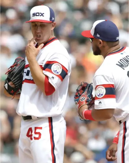  ?? | NAM Y. HUH/ AP ?? Derek Holland ( 6- 12) got the hook in the third inning and was rocked for seven runs. Holland’s ERA swelled to 5.68.