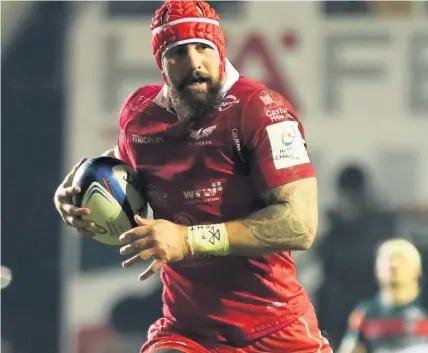  ?? Picture:: David Rogers/getty ?? Blade Thomson in action for the Scarlets.