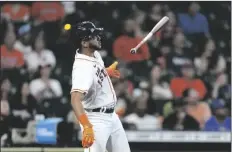  ?? DAVID J. PHILLIP/AP ?? HOUSTON ASTROS’ JOSE SIRI TOSSES HIS BAT after hitting a two-run home run against the Arizona Diamondbac­ks during the eighth inning of a game Sunday in Houston.