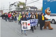  ?? ADAM MACINNIS/THE NEWS ?? There was a large turnout for the Children’s Wish Walk in New Glasgow on Oct. 19.