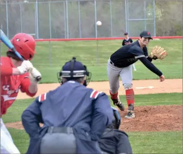  ?? PILOT PHOTO/RON HARAMIA ?? Glenn’s Brycen Hannah delivers a pitch to a Kankakee Valley batter during the championsh­ip game of the Dick Reese Classic Saturday. The Falcons won, 5-1, and are now 8-1 for the season.