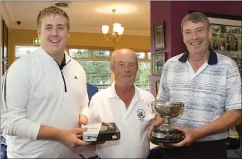  ??  ?? The Centenary Cup presentati­on in New Ross, sponsored by Mannions (from left): Michael Ryan Jnr. (gross), Peter Goggin (Captain), Val Molloy (winner).