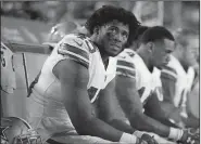  ?? AP Photo/JAE C. HONG ?? Dallas Cowboys running back Rod Smith sits on the bench during the team’s loss to the Los Angeles Rams in an NFL divisional football playoff game Saturday in Los Angeles.